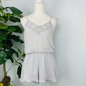 MARONIE LIGHT GREY LACE NECKLINE RUFFLE HHEM SHORT ROMPER